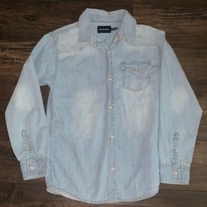 Youth boys Calvin Klein denim button up shirt. Light denim with yellow stitch.